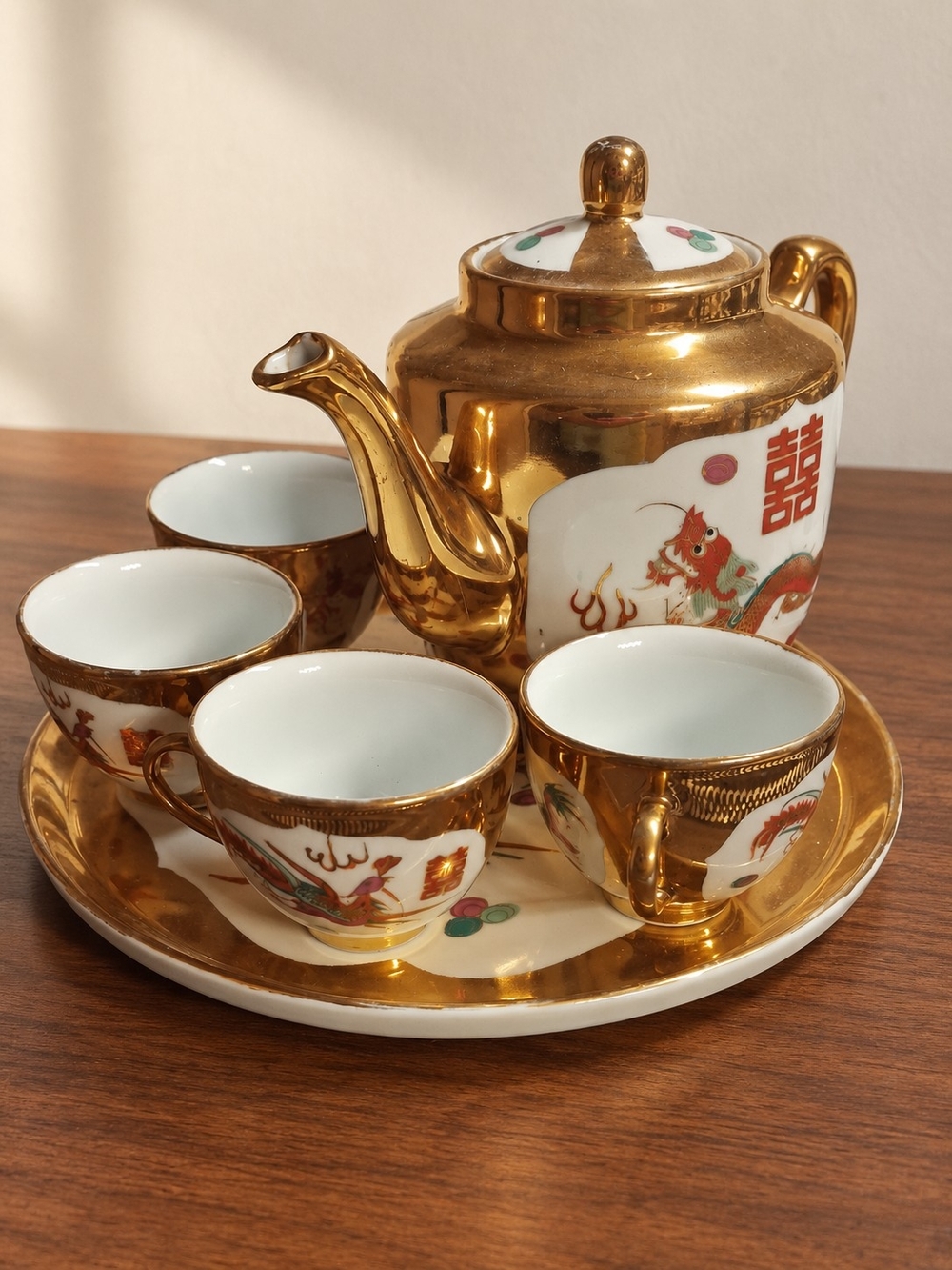 Gold Porcelain Tea Set with Red Dragon Accents
